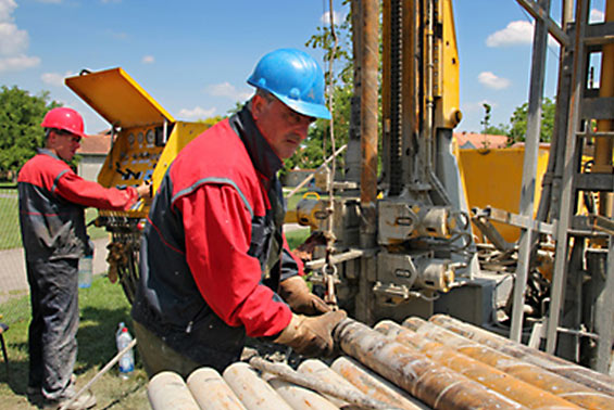 man working on drill pipe